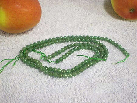 Green aventurine beads, spherical.