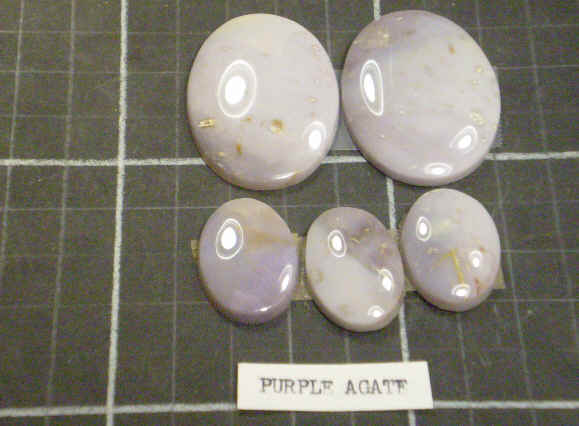 Cabochons of purple agate.
